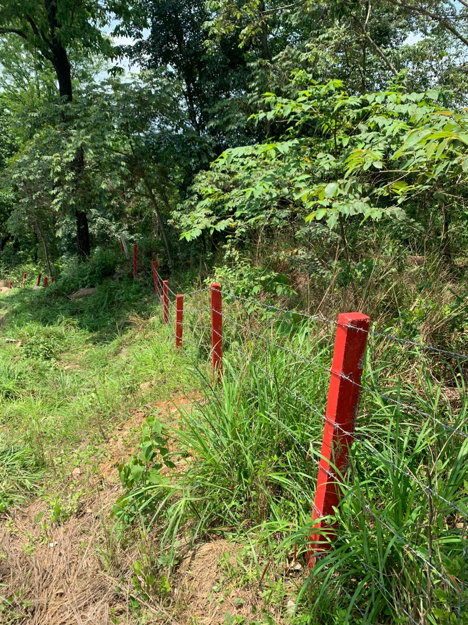 Barbed Wire Pillar Fencing Around Quarry